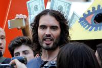 Russell Brand in a crowd of people