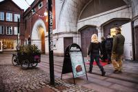 Photo of entrance to theatre with pedestrians