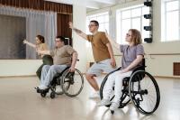 Four people dancing In a studio