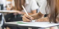 School students taking an exam