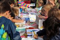 Photo of a group of children colouring