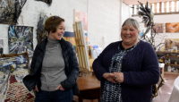 Photo of two woman smiling