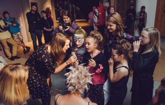 Photo of young people in gallery