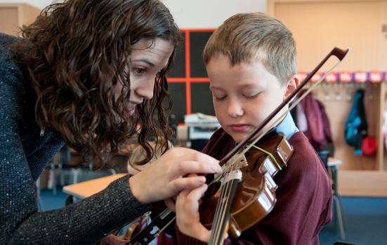 Boy playing violin