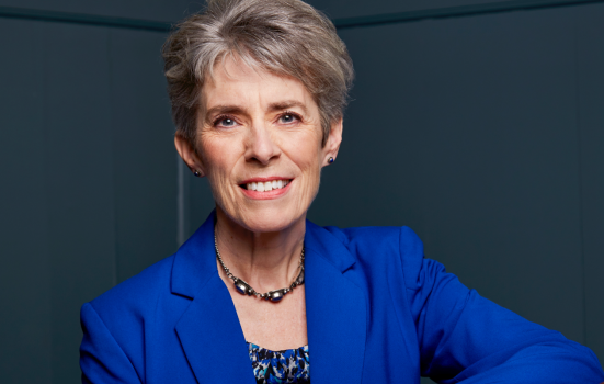 London Symphony Orchestra Managing Director Kathryn McDowell. She is facing the camera, smiling, wearing a blue suit jacket