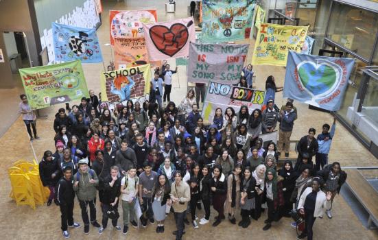 Image of people with banners