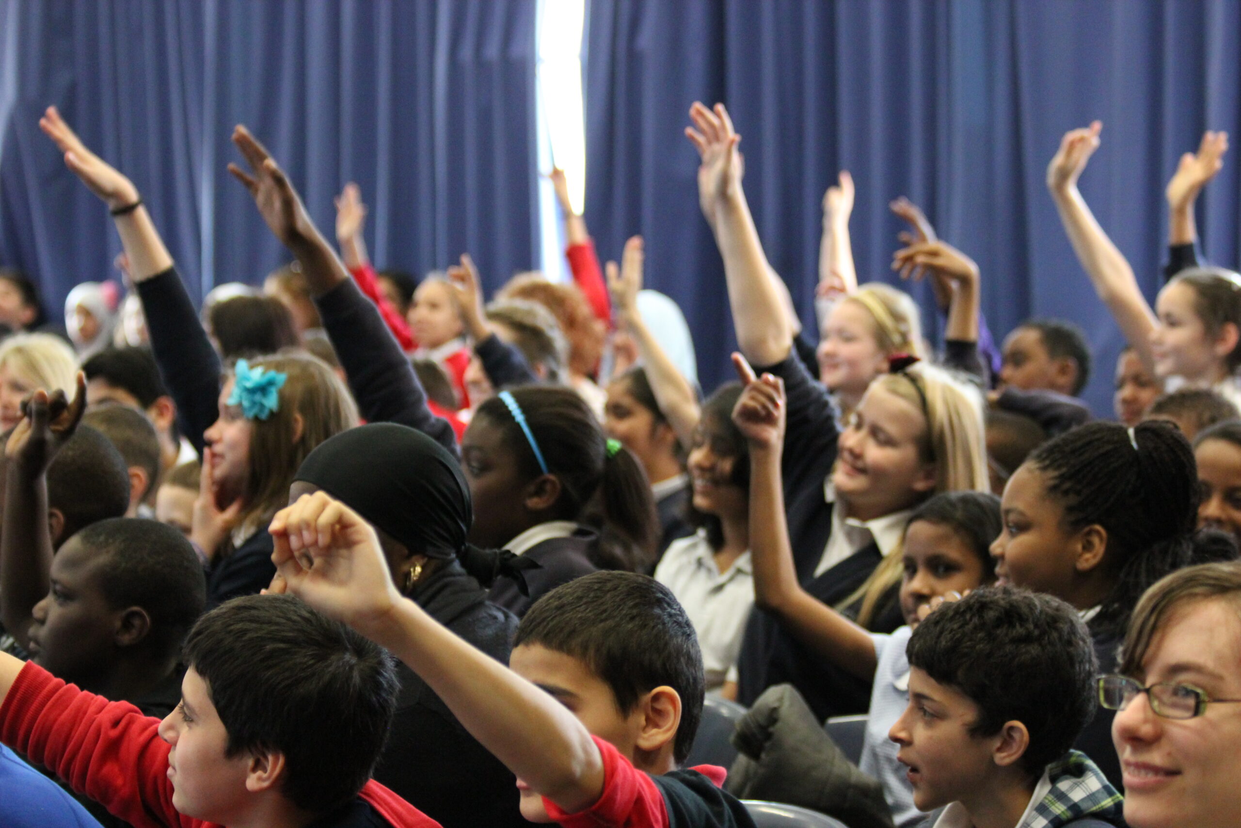 Children with hands up