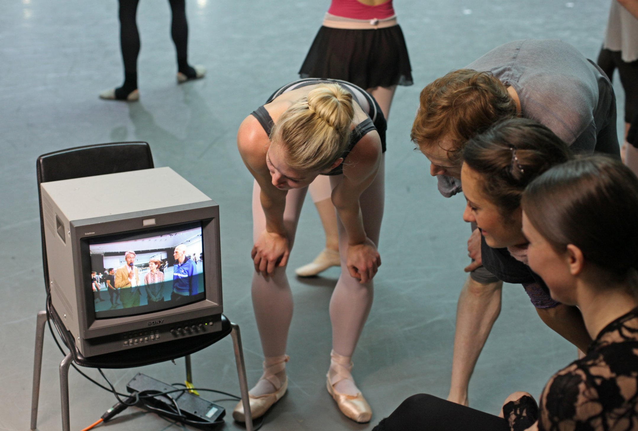 Image of dancers viewing screen