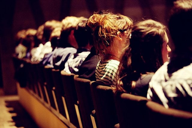 Photo of people sitting in cinema seats