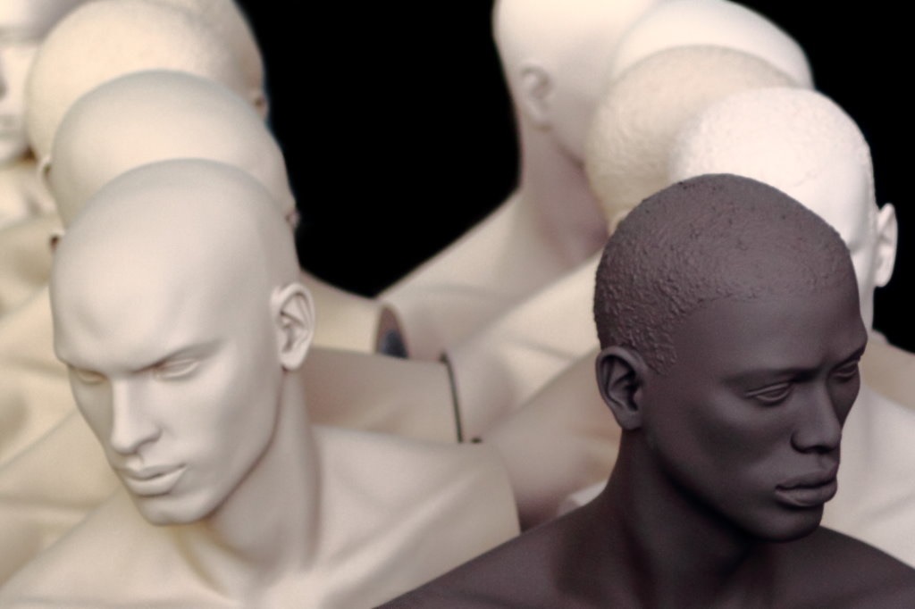 Diverse heads sculpture