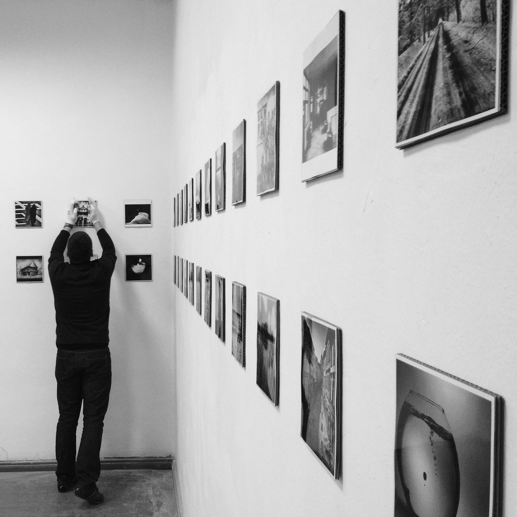 Photo of someone hanging a photo