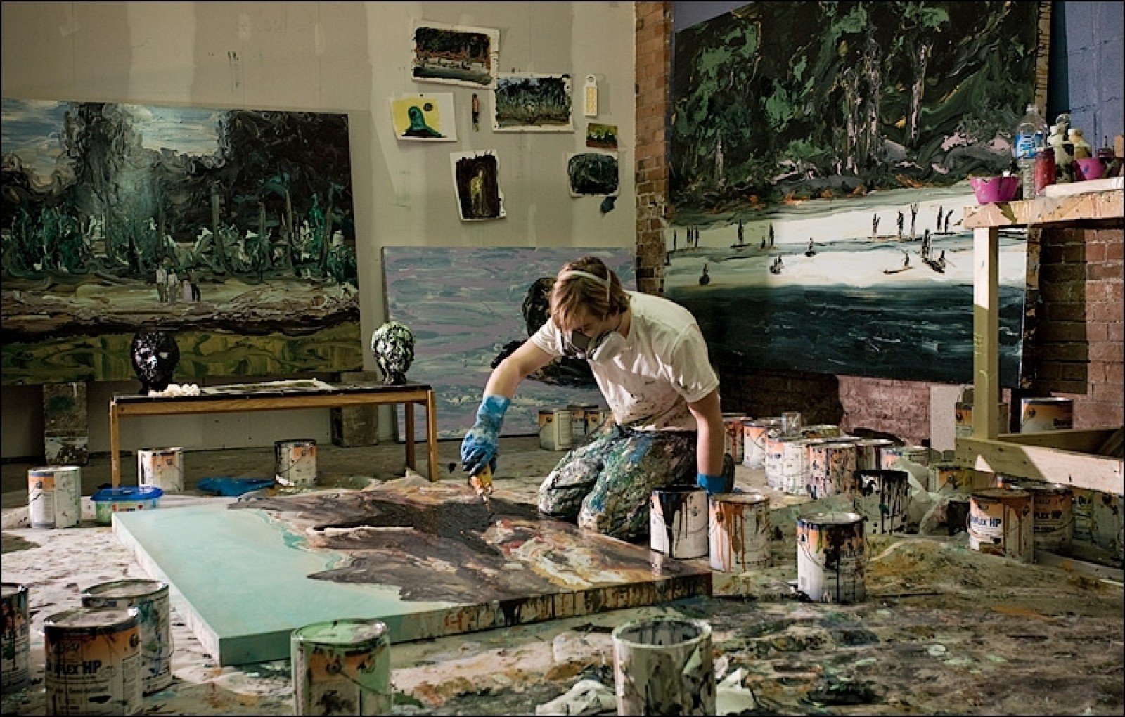 Man painting in artist studio