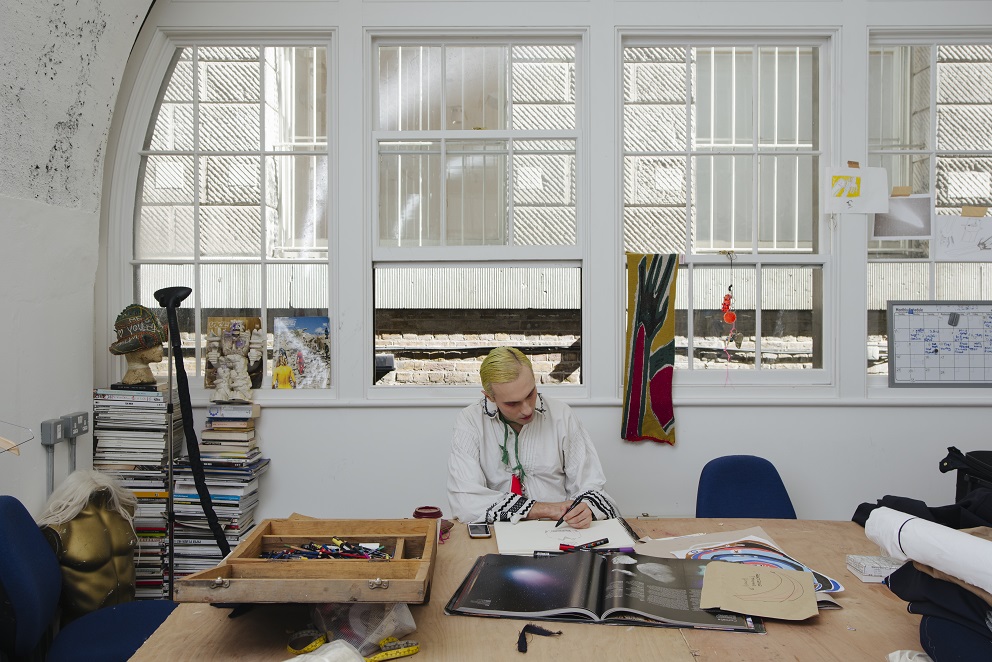 Photo of artist in studio