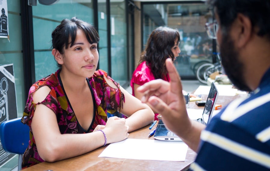 Photo of two people talking