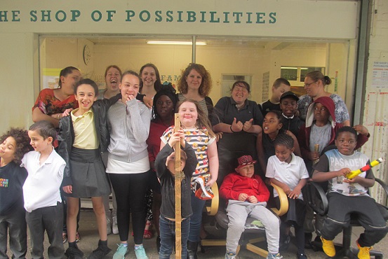 Photo of kids in front of the shop