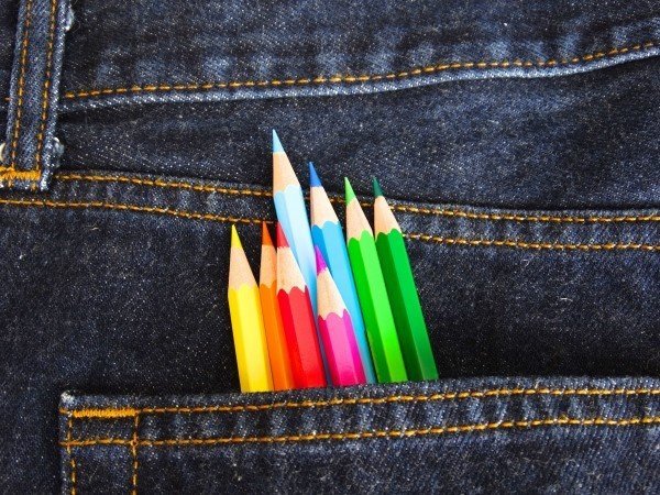 Photo of coloured pencils in jeans