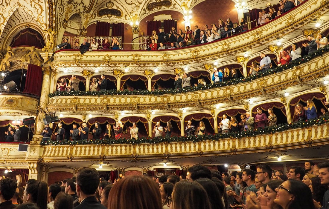 Photo of a standing ovation in a large theatre