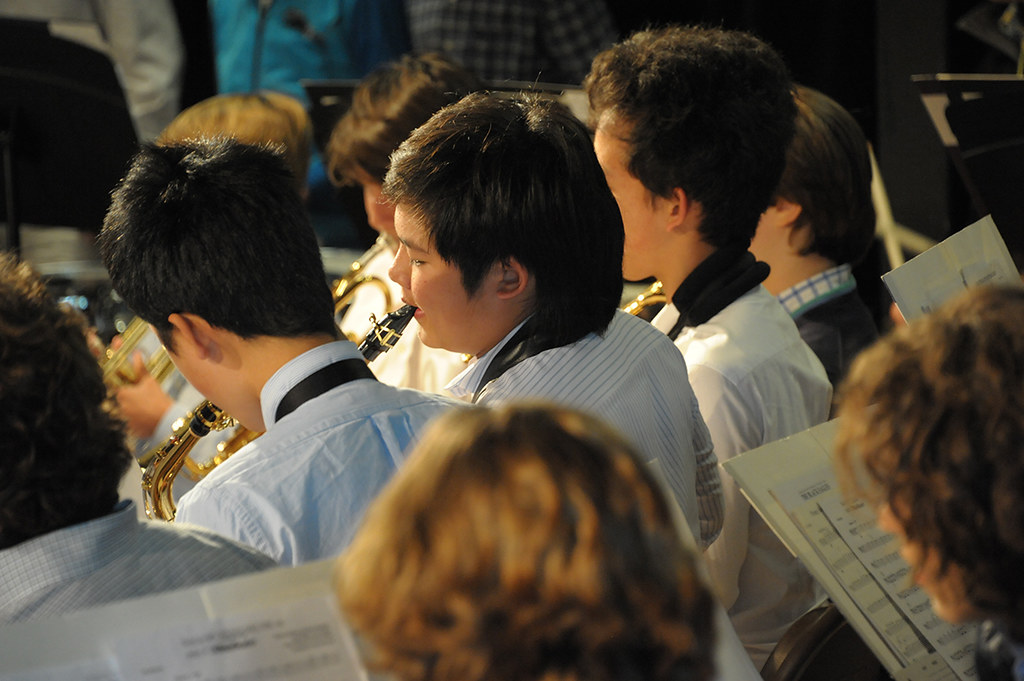 A photo of school pupils playing wind instruments