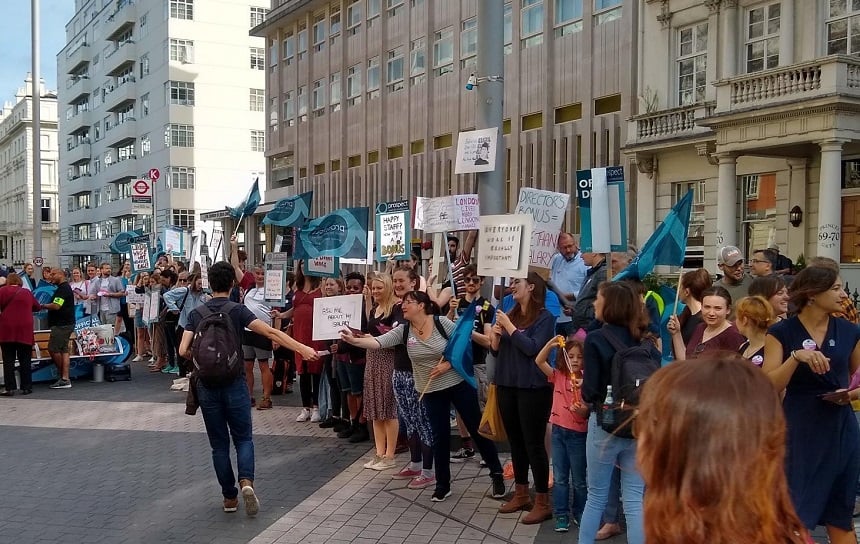 A photo of staff on strike holding placards outside the Science Museum in London