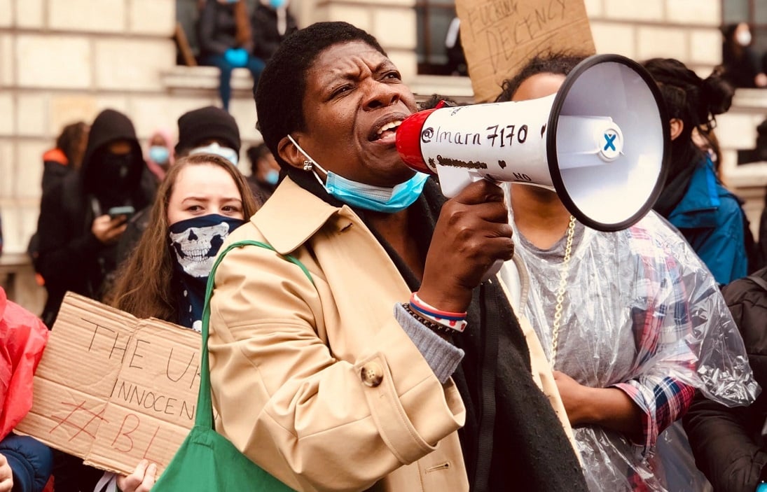 Protester with a megaphone at a Black Lives Matter march in London