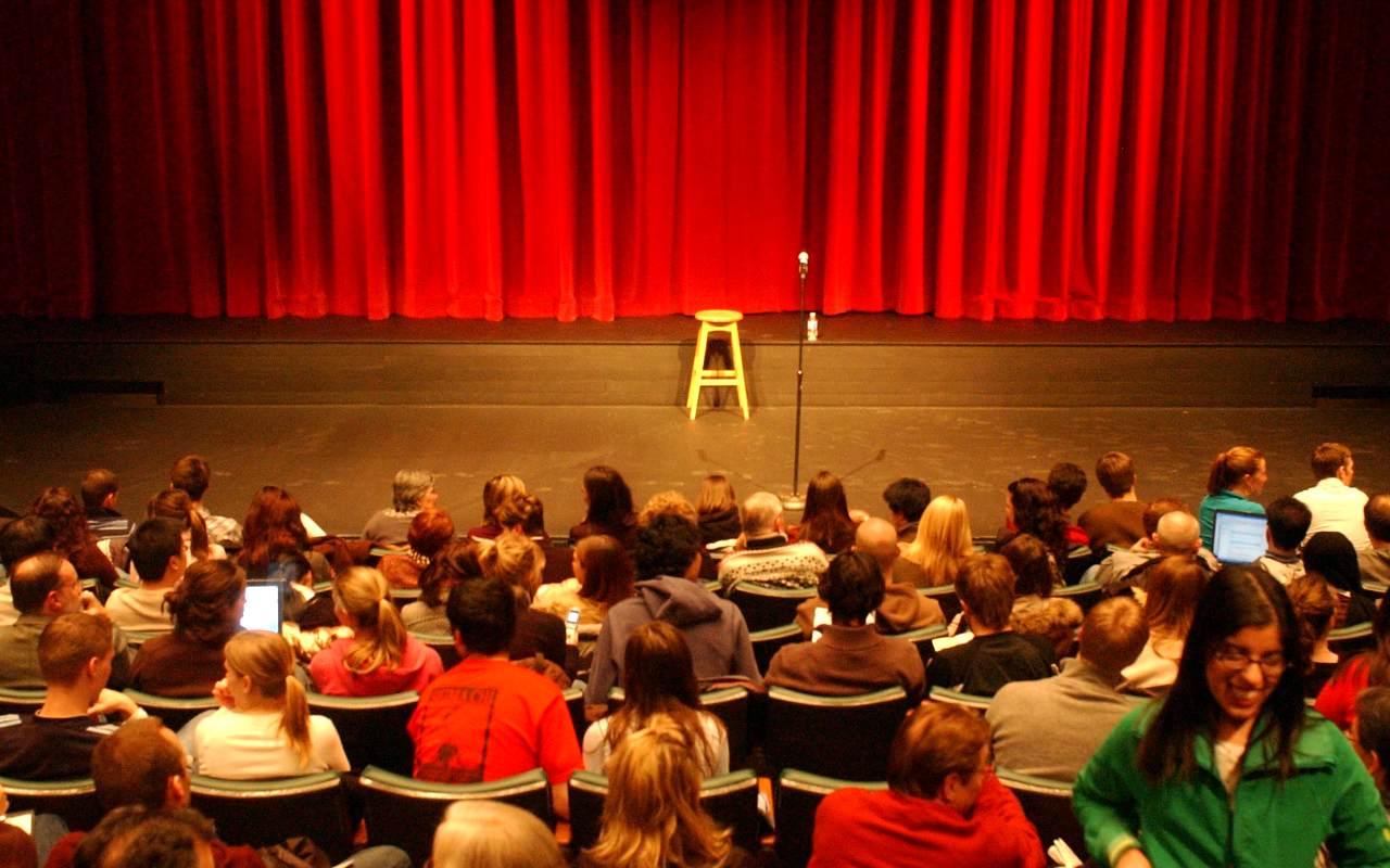 an audience waiting for a show to start