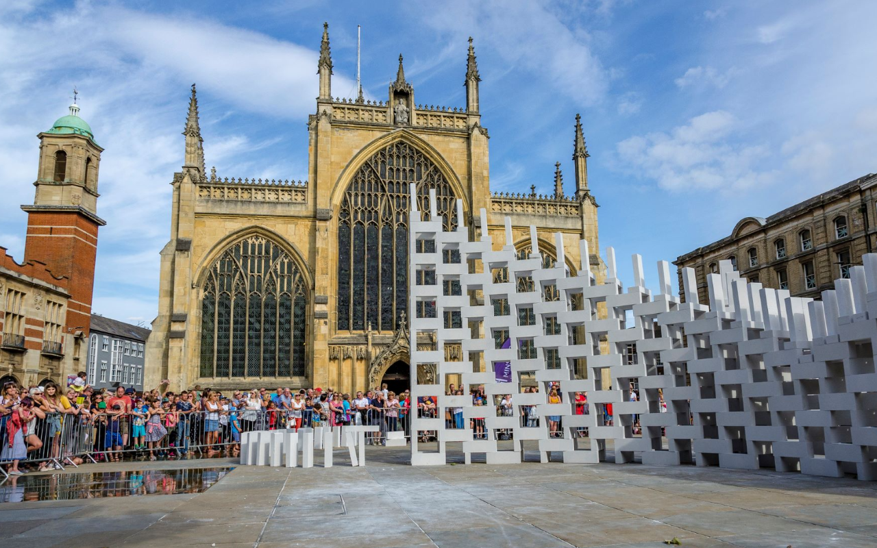 art installation of dominoes in a town square