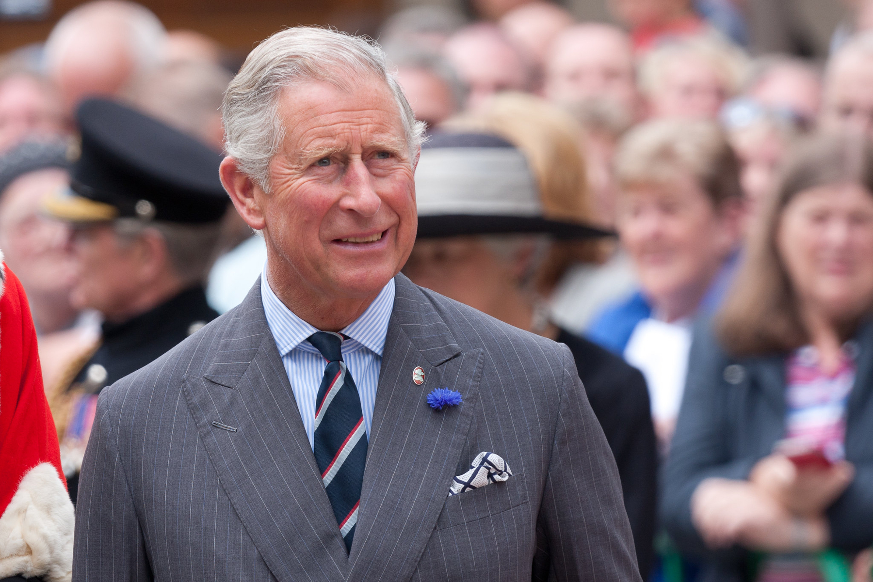 Charles III with crowd of people in the background