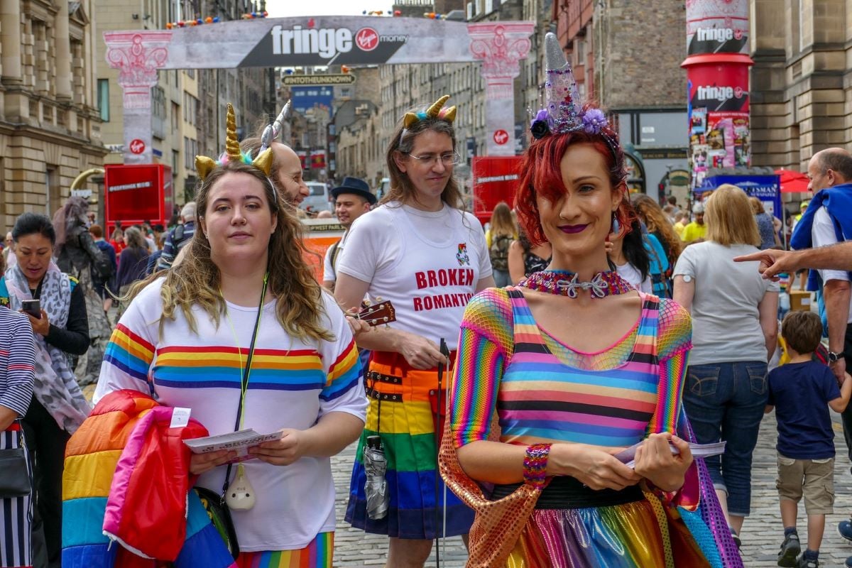 People walking through Edinburgh during the Fringe