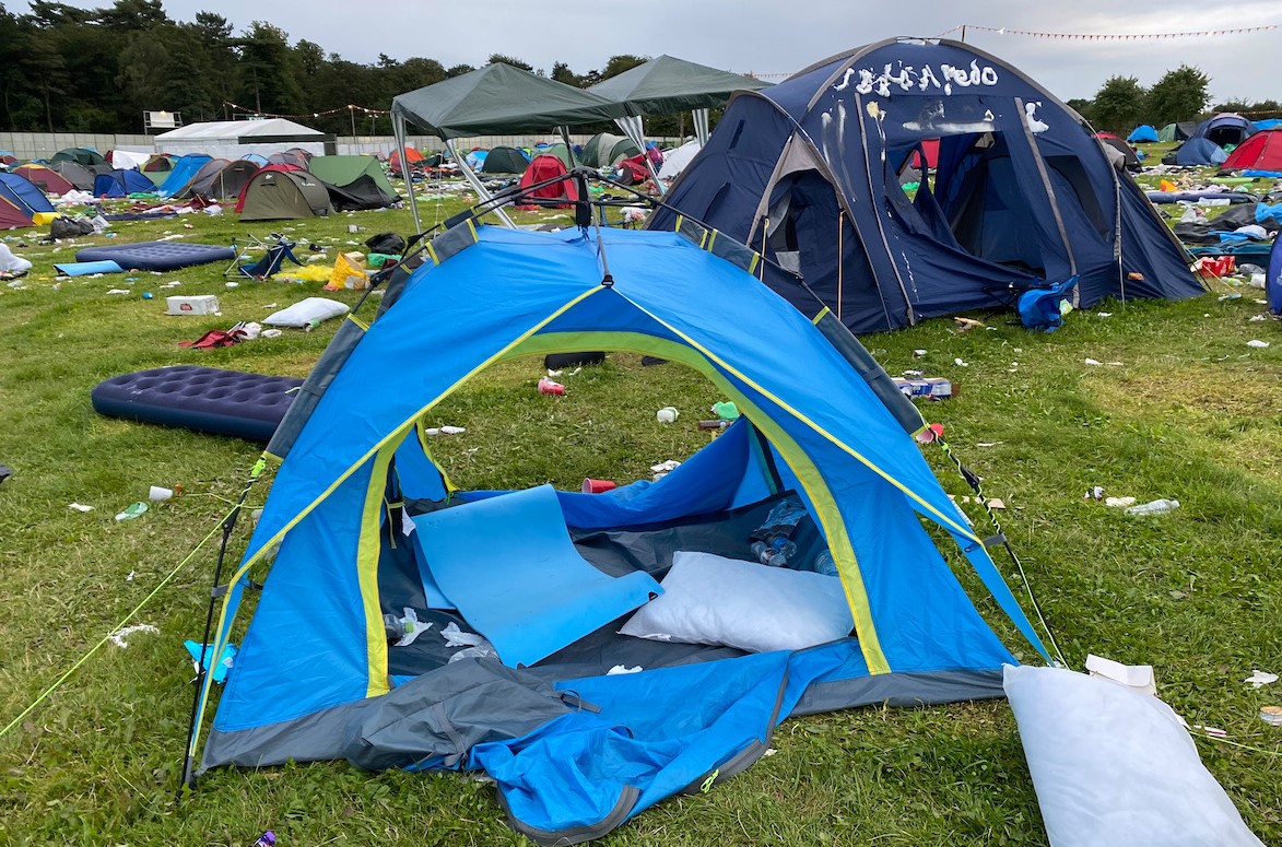 Abandoned tent in field of abandoned tents