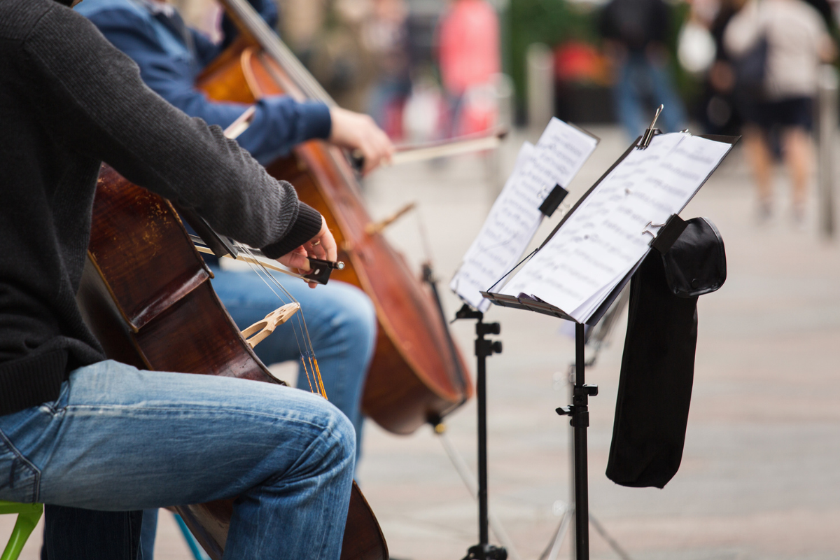 Two cellists performing in public