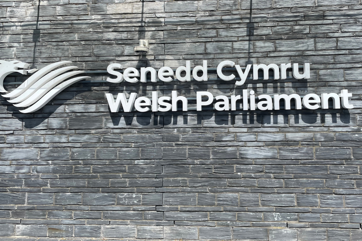 Senedd Cymru - Welsh Parliament signage outside the Senedd building