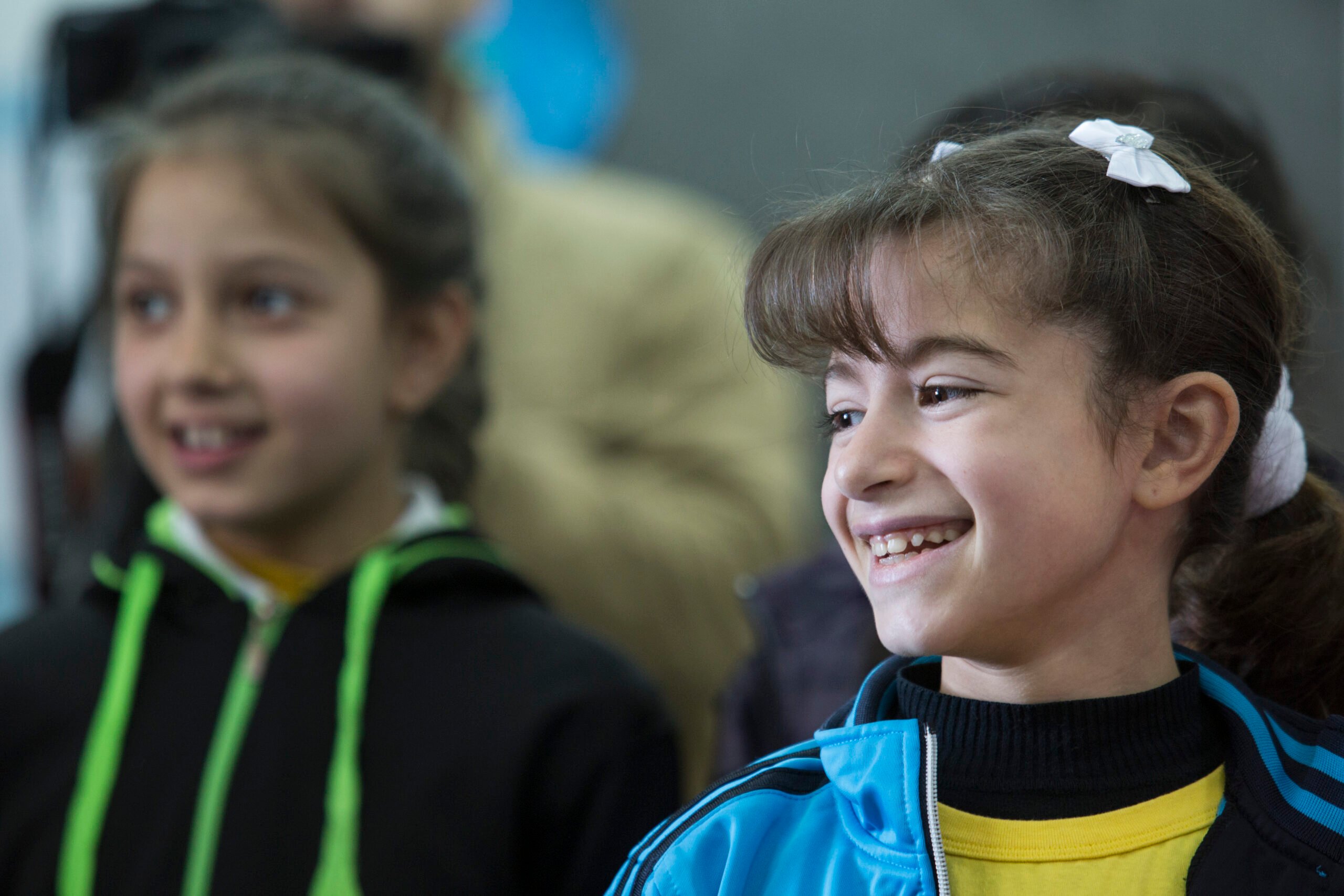 British Council World Voice Palestine Girl with bows smiling Sing Up Foundation